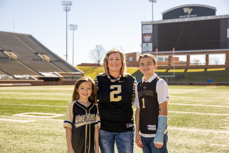 Tori Boysen with her family in the Truist Ballfield