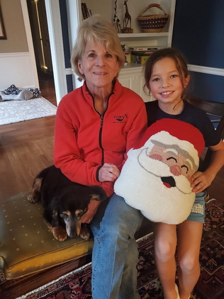 Holiday family pose with Santa pillow