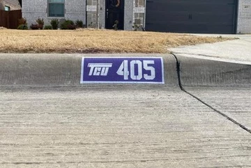 TCU special parking logo on curb