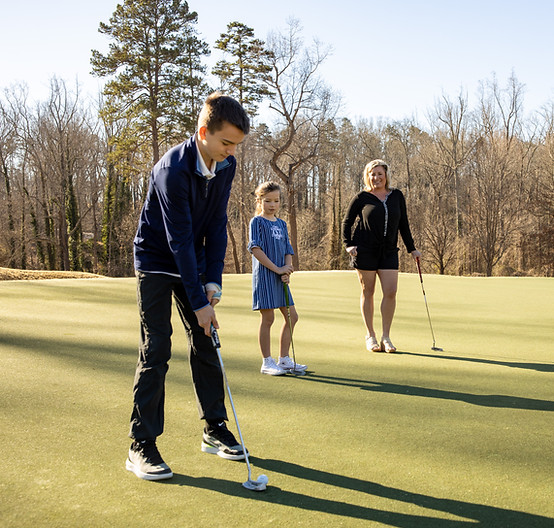 Tori and her kids golf