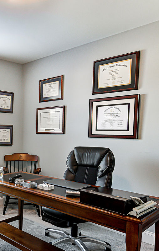 Real estate office with credential plaques